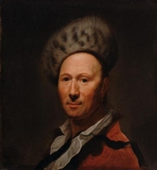 Portrait of a man wearing a fur hat